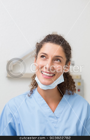 To use this stock image in your creative project, please select the size you need over to the right and click the "Add to Cart" button.
Your downloaded image will come with the Cutcaster watermark removed so don’t worry about the watermark you see on this page. Dentist in blue scrubs smiling and thinking stock photo, Dentist in blue scrubs smiling and thinking at the dental clinic by Wavebreak Media