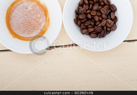 To use this stock image in your creative project, please select the size you need over to the right and click the "Add to Cart" button.
Your downloaded image will come with the Cutcaster watermark removed so don’t worry about the watermark you see on this page. espresso cofee and beans stock photo, italian espresso cofee and beans on a white wood table by Francesco Perre