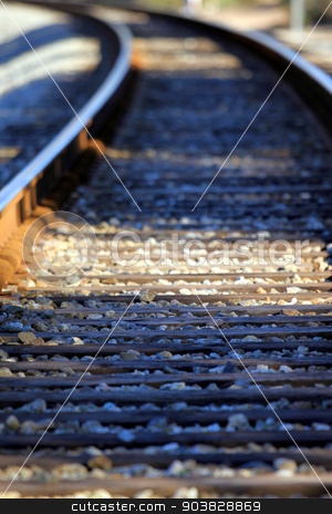 To use this stock image in your creative project, please select the size you need over to the right and click the "Add to Cart" button.
Your downloaded image will come with the Cutcaster watermark removed so don’t worry about the watermark you see on this page. Train Tacks stock photo, Lower view of train tracks with gravel. by Henrik Lehnerer