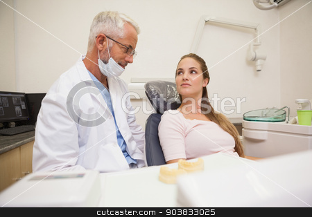 To use this stock image in your creative project, please select the size you need over to the right and click the "Add to Cart" button.
Your downloaded image will come with the Cutcaster watermark removed so don’t worry about the watermark you see on this page. Dentist and patient looking at each other stock photo, Dentist and patient looking at each other at the dental clinic by Wavebreak Media