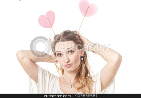 To use this stock image in your creative project, please select the size you need over to the right and click the "Add to Cart" button.
Your downloaded image will come with the Cutcaster watermark removed so don’t worry about the watermark you see on this page. Girl fun posing with two hearts in studio stock photo, Cute lady having fun and posing with two St Valentine hearts in studio by Oleksandr Solonenko