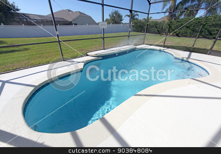To use this stock image in your creative project, please select the size you need over to the right and click the "Add to Cart" button.
Your downloaded image will come with the Cutcaster watermark removed so don’t worry about the watermark you see on this page. Swimming Pool stock photo, A swimming pool at a home in Florida by Lucy Clark