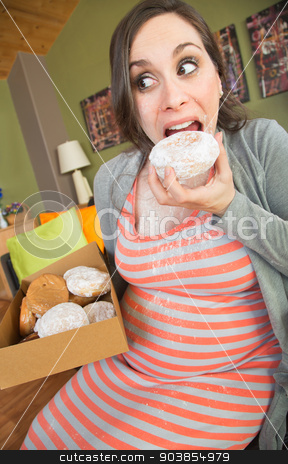 To use this stock image in your creative project, please select the size you need over to the right and click the "Add to Cart" button.
Your downloaded image will come with the Cutcaster watermark removed so don’t worry about the watermark you see on this page. Messy Pregnant Woman Eating stock photo, Happy pregnant woman making a mess eating donuts by Scott Griessel