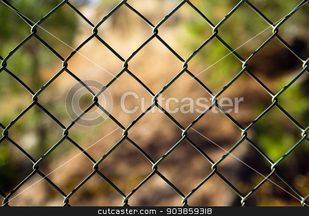 To use this stock image in your creative project, please select the size you need over to the right and click the "Add to Cart" button.
Your downloaded image will come with the Cutcaster watermark removed so don’t worry about the watermark you see on this page. Diagonal Diamond Pattern Chain Link Fence Outside Boundary stock photo, An ordinary chain link fence section by Christopher Boswell