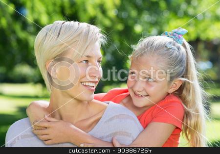 To use this stock image in your creative project, please select the size you need over to the right and click the "Add to Cart" button.
Your downloaded image will come with the Cutcaster watermark removed so don’t worry about the watermark you see on this page. Happy blonde with her daughter in the park stock photo, Happy blonde with her daughter in the park on a sunny day by Wavebreak Media