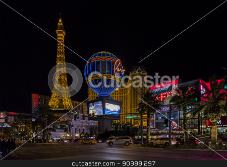 To use this stock image in your creative project, please select the size you need over to the right and click the "Add to Cart" button.
Your downloaded image will come with the Cutcaster watermark removed so don’t worry about the watermark you see on this page. Las Vegas Strip stock photo, LAS VEGAS NV/USA - DECEMBER 24: The Las Vegas Strip on Christmas Eve with Paris Las Vegas Hotel and Casino. December 24, 2014 in Las Vegas, NV, USA. by Scott Griessel