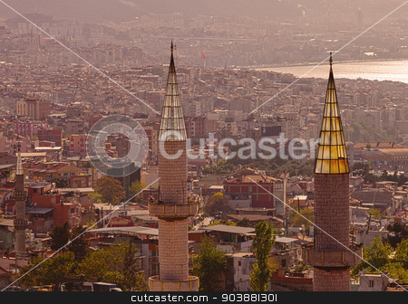 To use this stock image in your creative project, please select the size you need over to the right and click the "Add to Cart" button.
Your downloaded image will come with the Cutcaster watermark removed so don’t worry about the watermark you see on this page. Minarets in Izmir Turkey stock photo, Two minarets in the Turkish port city of Izmir by Scott Griessel
