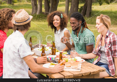 To use this stock image in your creative project, please select the size you need over to the right and click the "Add to Cart" button.
Your downloaded image will come with the Cutcaster watermark removed so don’t worry about the watermark you see on this page. Happy friends in the park having lunch stock photo, Happy friends in the park having lunch on a sunny day by Wavebreak Media