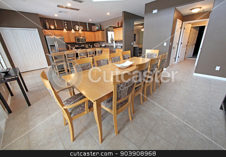 To use this stock image in your creative project, please select the size you need over to the right and click the "Add to Cart" button.
Your downloaded image will come with the Cutcaster watermark removed so don’t worry about the watermark you see on this page. Kitchen and Dining Area stock photo, A Kitchen and Dining Area in a Home by Lucy Clark
