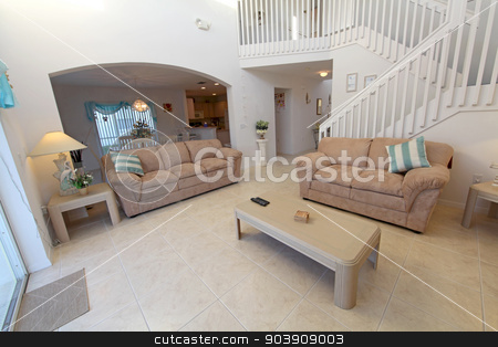 To use this stock image in your creative project, please select the size you need over to the right and click the "Add to Cart" button.
Your downloaded image will come with the Cutcaster watermark removed so don’t worry about the watermark you see on this page. Living Room stock photo, A Living Room in a Home in Florida by Lucy Clark