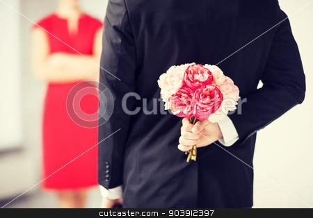 To use this stock image in your creative project, please select the size you need over to the right and click the "Add to Cart" button.
Your downloaded image will come with the Cutcaster watermark removed so don’t worry about the watermark you see on this page. man hiding bouquet of flowers stock photo, man hiding bouquet of flowers behind his back. by Syda Productions
