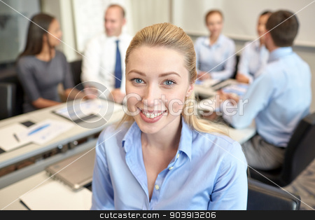 To use this stock image in your creative project, please select the size you need over to the right and click the "Add to Cart" button.
Your downloaded image will come with the Cutcaster watermark removed so don’t worry about the watermark you see on this page. group of smiling businesspeople meeting in office stock photo, business, people and teamwork concept - smiling businesswoman with group of businesspeople meeting in office by Syda Productions