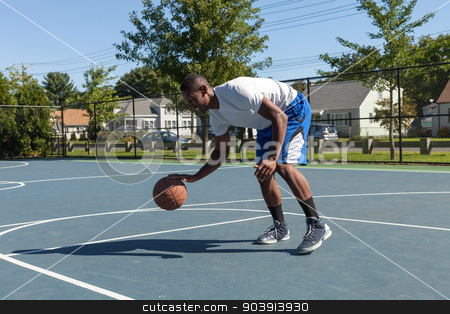 To use this stock image in your creative project, please select the size you need over to the right and click the "Add to Cart" button.
Your downloaded image will come with the Cutcaster watermark removed so don’t worry about the watermark you see on this page. Basketball Player Dribbling stock photo, A sweaty young basketball player dribbling down the court demonstrating his ball handling skills. by Todd Arena