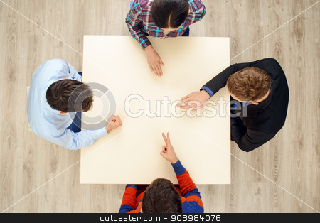 To use this stock image in your creative project, please select the size you need over to the right and click the "Add to Cart" button.
Your downloaded image will come with the Cutcaster watermark removed so don’t worry about the watermark you see on this page. Top view people playing rock paper scissors stock photo, Top view of table with group of creative people playing rock paper scissors game by Dmytro Sidelnikov