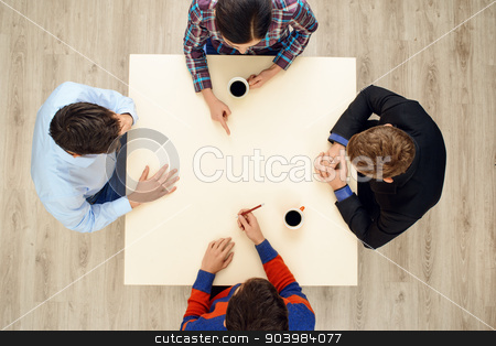 To use this stock image in your creative project, please select the size you need over to the right and click the "Add to Cart" button.
Your downloaded image will come with the Cutcaster watermark removed so don’t worry about the watermark you see on this page. Top view table with group of young people stock photo, Top view of table with group of busy creative young people working on project. Business team concept by Dmytro Sidelnikov