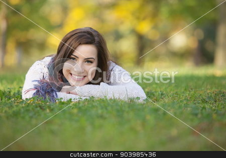To use this stock image in your creative project, please select the size you need over to the right and click the "Add to Cart" button.
Your downloaded image will come with the Cutcaster watermark removed so don’t worry about the watermark you see on this page. Happy Teen Laying On Grass stock photo, Happy smiling young woman laying down on grass by Scott Griessel