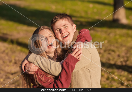To use this stock image in your creative project, please select the size you need over to the right and click the "Add to Cart" button.
Your downloaded image will come with the Cutcaster watermark removed so don’t worry about the watermark you see on this page. Teen Couple Laughing stock photo, Laughing caucasian male and female couple embracing outdoors by Scott Griessel