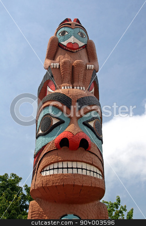 To use this stock image in your creative project, please select the size you need over to the right and click the "Add to Cart" button.
Your downloaded image will come with the Cutcaster watermark removed so don’t worry about the watermark you see on this page. Totem Pole stock photo, A totem pole with faces in the forest by Lucy Clark
