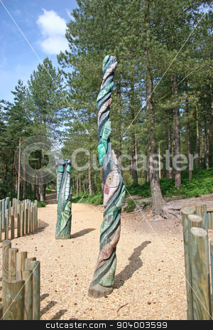 To use this stock image in your creative project, please select the size you need over to the right and click the "Add to Cart" button.
Your downloaded image will come with the Cutcaster watermark removed so don’t worry about the watermark you see on this page. Totem Poles stock photo, Two totem poles in the forest by Lucy Clark