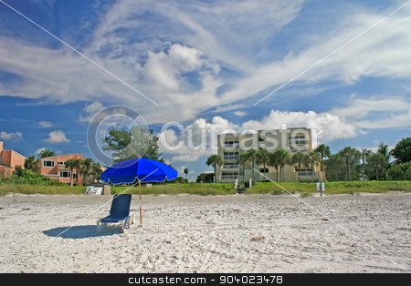 To use this stock image in your creative project, please select the size you need over to the right and click the "Add to Cart" button.
Your downloaded image will come with the Cutcaster watermark removed so don’t worry about the watermark you see on this page. Beach stock photo, A beach with a chair and umbrella by Lucy Clark