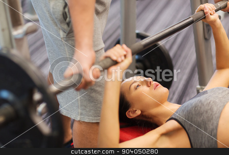 To use this stock image in your creative project, please select the size you need over to the right and click the "Add to Cart" button.
Your downloaded image will come with the Cutcaster watermark removed so don’t worry about the watermark you see on this page. man and woman with barbell flexing muscles in gym stock photo, sport, fitness, teamwork, weightlifting and people concept - young woman and personal trainer with barbell flexing muscles in gym by Syda Productions