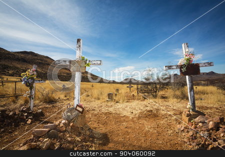 To use this stock image in your creative project, please select the size you need over to the right and click the "Add to Cart" button.
Your downloaded image will come with the Cutcaster watermark removed so don’t worry about the watermark you see on this page. Old Graves with Crucifix stock photo, Trio of wooden crucifix burial sites with blank signs by Scott Griessel