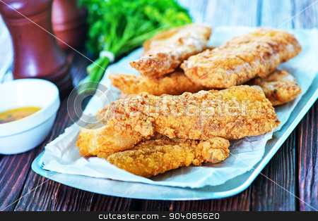 To use this stock image in your creative project, please select the size you need over to the right and click the "Add to Cart" button.
Your downloaded image will come with the Cutcaster watermark removed so don’t worry about the watermark you see on this page. fried fish stock photo, fried fish on tray and on a table by tycoon