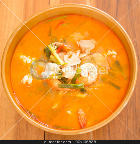 To use this stock image in your creative project, please select the size you need over to the right and click the "Add to Cart" button.
Your downloaded image will come with the Cutcaster watermark removed so don’t worry about the watermark you see on this page. Tom Yum Kung thai spicy seafood soup stock photo, Tom Yum Kung thai spicy seafood soup by nalinratphi