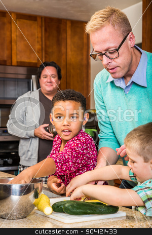 To use this stock image in your creative project, please select the size you need over to the right and click the "Add to Cart" button.
Your downloaded image will come with the Cutcaster watermark removed so don’t worry about the watermark you see on this page. Dads in Kitchen stock photo, Two dads in kitchen cook with children by Scott Griessel