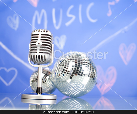 To use this stock image in your creative project, please select the size you need over to the right and click the "Add to Cart" button.
Your downloaded image will come with the Cutcaster watermark removed so don’t worry about the watermark you see on this page. Microphone with disco balls, music saturated concept stock photo, Microphone with disco balls, music saturated concept by Sebastian Duda