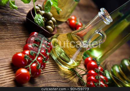 To use this stock image in your creative project, please select the size you need over to the right and click the "Add to Cart" button.
Your downloaded image will come with the Cutcaster watermark removed so don’t worry about the watermark you see on this page. Olive oils in bottles, Mediterranean rural theme stock photo, Olive oils in bottles, Mediterranean rural theme by Sebastian Duda