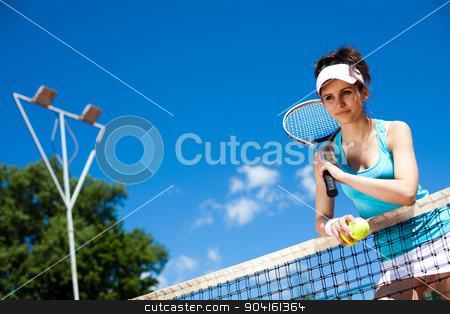 To use this stock image in your creative project, please select the size you need over to the right and click the "Add to Cart" button.
Your downloaded image will come with the Cutcaster watermark removed so don’t worry about the watermark you see on this page. Woman playing tennis, summertime saturated theme stock photo, Woman playing tennis, summertime saturated theme by Sebastian Duda