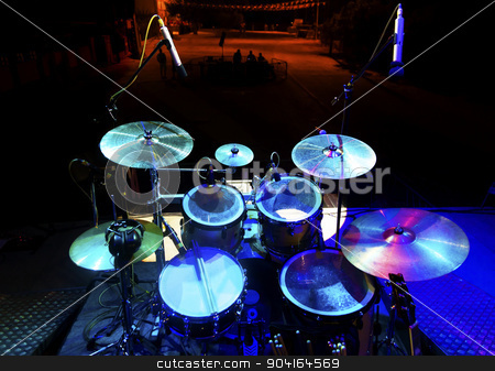 To use this stock image in your creative project, please select the size you need over to the right and click the "Add to Cart" button.
Your downloaded image will come with the Cutcaster watermark removed so don’t worry about the watermark you see on this page. Drum on stage stock photo, Live music and instrument. Drum on stage by carloscastilla