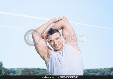 To use this stock image in your creative project, please select the size you need over to the right and click the "Add to Cart" button.
Your downloaded image will come with the Cutcaster watermark removed so don’t worry about the watermark you see on this page. Portrait of a handsome sportsman stock photo, Portrait of a young handsome sportsman making light exercises in the park on sunny day holding his arms behind his head, wearing white short and smiling by Viacheslav Iakobchuk