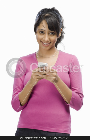 To use this stock image in your creative project, please select the size you need over to the right and click the "Add to Cart" button.
Your downloaded image will come with the Cutcaster watermark removed so don’t worry about the watermark you see on this page. pims_20090330_sh0496.jpg stock photo, Portrait of a young woman text messaging by imagedb