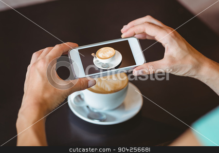 To use this stock image in your creative project, please select the size you need over to the right and click the "Add to Cart" button.
Your downloaded image will come with the Cutcaster watermark removed so don’t worry about the watermark you see on this page. Woman taking picture with her smartphone stock photo, Woman taking picture with her smartphone at the cafe by Wavebreak Media