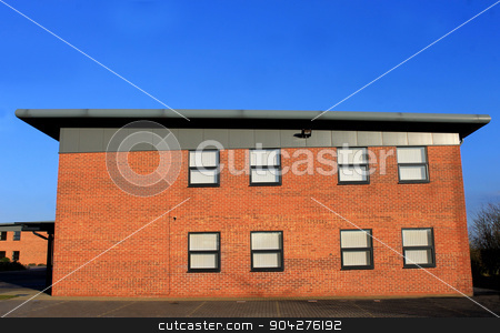 To use this stock image in your creative project, please select the size you need over to the right and click the "Add to Cart" button.
Your downloaded image will come with the Cutcaster watermark removed so don’t worry about the watermark you see on this page. Modern office building stock photo, Exterior of a modern office building by Martin Crowdy