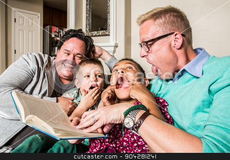To use this stock image in your creative project, please select the size you need over to the right and click the "Add to Cart" button.
Your downloaded image will come with the Cutcaster watermark removed so don’t worry about the watermark you see on this page. Cute Family Making Faces stock photo, Homosexual parents reading and making faces with son and daughter by Scott Griessel