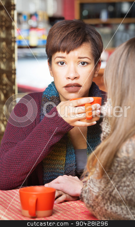 To use this stock image in your creative project, please select the size you need over to the right and click the "Add to Cart" button.
Your downloaded image will come with the Cutcaster watermark removed so don’t worry about the watermark you see on this page. Sympathetic Woman with Friend stock photo, Sympathetic woman with friend at coffee house indoors by Scott Griessel