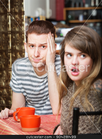To use this stock image in your creative project, please select the size you need over to the right and click the "Add to Cart" button.
Your downloaded image will come with the Cutcaster watermark removed so don’t worry about the watermark you see on this page. Irritated Woman with Man stock photo, Frustrated young man sitting in cafe with woman by Scott Griessel