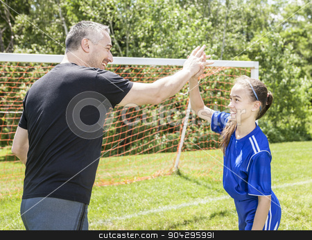 To use this stock image in your creative project, please select the size you need over to the right and click the "Add to Cart" button.
Your downloaded image will come with the Cutcaster watermark removed so don’t worry about the watermark you see on this page. teenager girl with his father play soccer in a beautiful day stock photo, A teenager girl with his father play soccer in a beautiful day by Louis-Paul St-Onge
