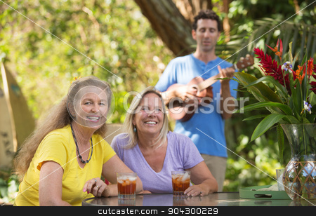 To use this stock image in your creative project, please select the size you need over to the right and click the "Add to Cart" button.
Your downloaded image will come with the Cutcaster watermark removed so don’t worry about the watermark you see on this page. Happy Friends with Ukelele Player stock photo, Two beautiful happy women with male ukelele player by Scott Griessel