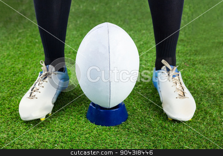 To use this stock image in your creative project, please select the size you need over to the right and click the "Add to Cart" button.
Your downloaded image will come with the Cutcaster watermark removed so don’t worry about the watermark you see on this page. Rugby player ready to make a drop kick stock photo, Low angle view of a rugby player ready to make a drop kick by Wavebreak Media