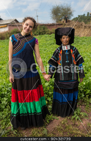 To use this stock image in your creative project, please select the size you need over to the right and click the "Add to Cart" button.
Your downloaded image will come with the Cutcaster watermark removed so don’t worry about the watermark you see on this page. Woman in national costume with family stock photo, Woman in national costume with family in the china by Vassiliy Kochetkov