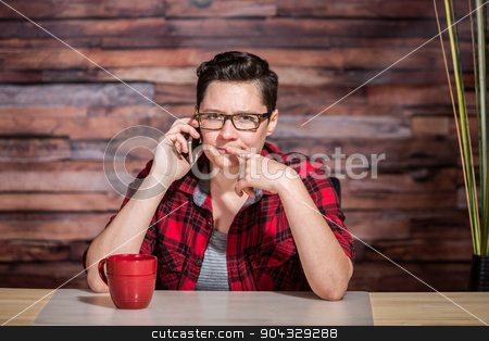 To use this stock image in your creative project, please select the size you need over to the right and click the "Add to Cart" button.
Your downloaded image will come with the Cutcaster watermark removed so don’t worry about the watermark you see on this page. Thinking Office Worker on Phone stock photo, Thinking office worker with eyeglasses and phone by Scott Griessel
