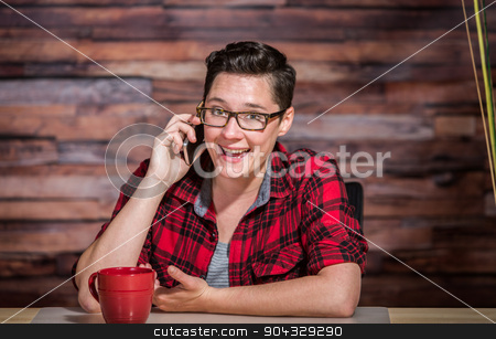 To use this stock image in your creative project, please select the size you need over to the right and click the "Add to Cart" button.
Your downloaded image will come with the Cutcaster watermark removed so don’t worry about the watermark you see on this page. Enthusiastic Woman on Smart Phone stock photo, Enthusiastic woman in business casual outfit on phone by Scott Griessel