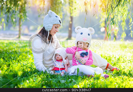To use this stock image in your creative project, please select the size you need over to the right and click the "Add to Cart" button.
Your downloaded image will come with the Cutcaster watermark removed so don’t worry about the watermark you see on this page. Mom and daughter playing in the park stock photo, Mom and daughter playing in the park. by timonko