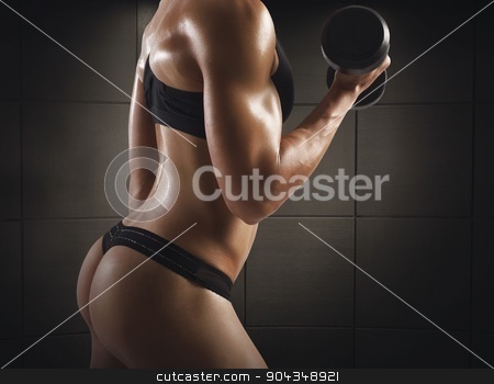 To use this stock image in your creative project, please select the size you need over to the right and click the "Add to Cart" button.
Your downloaded image will come with the Cutcaster watermark removed so don’t worry about the watermark you see on this page. Sexy gym female stock photo, Gym woman train with dumbbell in thong by Federico Caputo