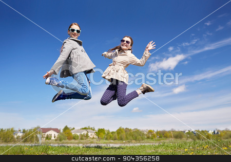 To use this stock image in your creative project, please select the size you need over to the right and click the "Add to Cart" button.
Your downloaded image will come with the Cutcaster watermark removed so don’t worry about the watermark you see on this page. happy little girls jumping high outdoors stock photo, people, children, friends and friendship concept - happy little girls jumping high outdoors by Syda Productions
