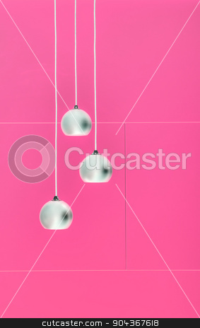 To use this stock image in your creative project, please select the size you need over to the right and click the "Add to Cart" button.
Your downloaded image will come with the Cutcaster watermark removed so don’t worry about the watermark you see on this page. Pimk negative collage of three ceiling lights stock photo, Negative collage of three ceiling lights, loft-style interior. Pink color. by bezikus